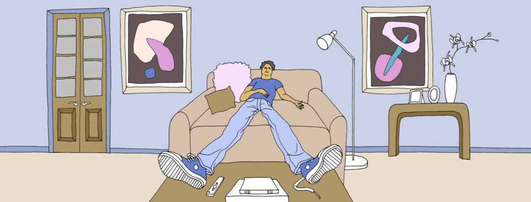 a man has a lack of motivation and hasn't moved from his sofa